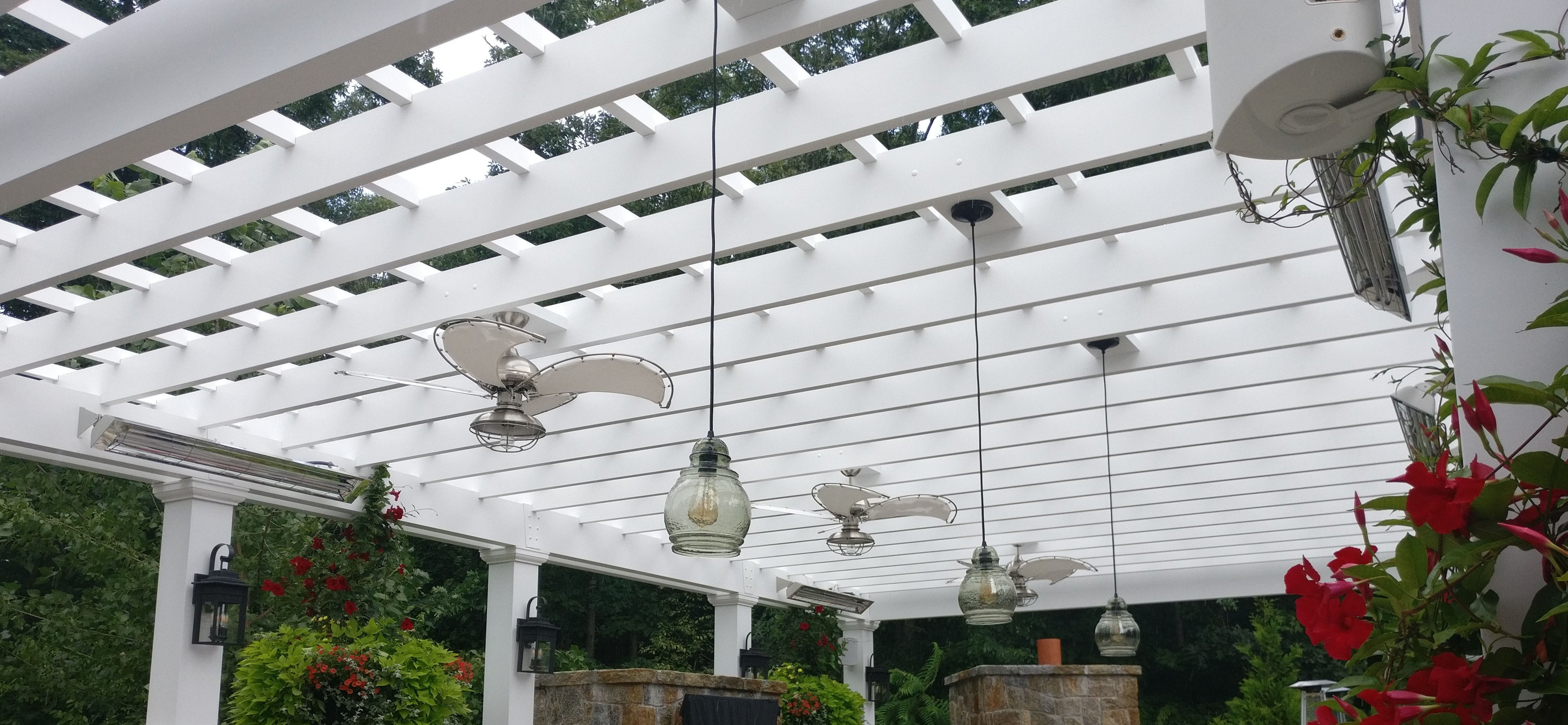 Fabulous pergola with many electrical options including fans, lighting and outlets.